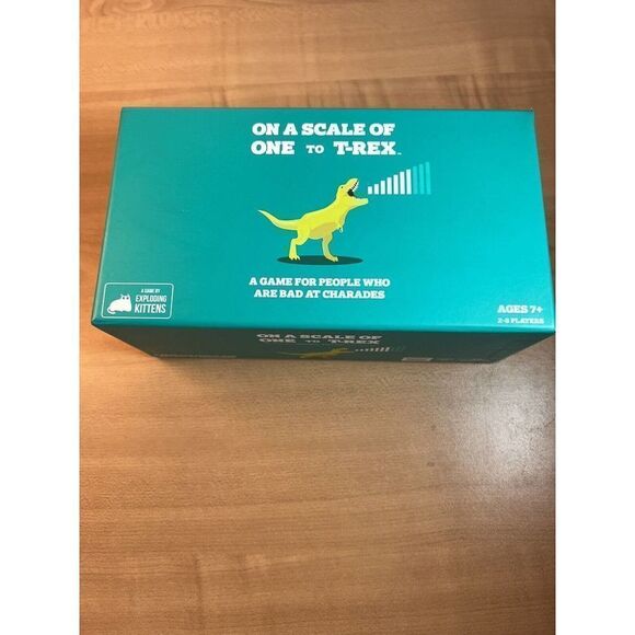 Exploding Kittens On A Scale of One to T-Rex 2-8 Players Party Game New Open Box - Picture 1 of 6